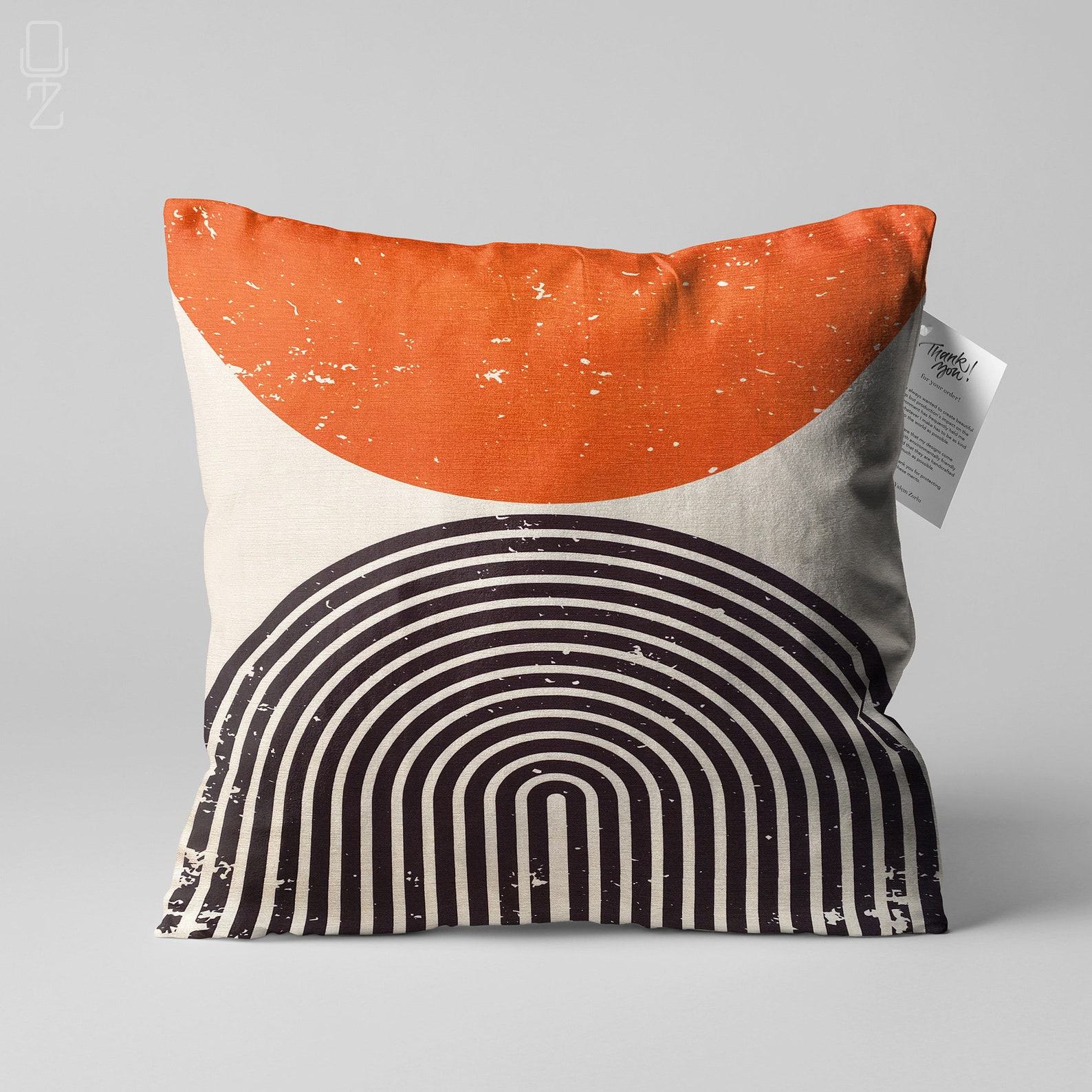 Abstract Ivory Cushion Cover Designs with Vibrant Orange Accents