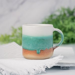 Artisan-Crafted Stoneware Mug An Enchanting Tapestry of White and Green