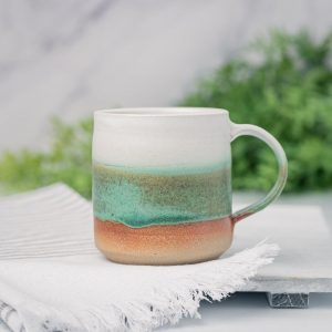 Artisan-Crafted Stoneware Mug An Enchanting Tapestry of White and Green