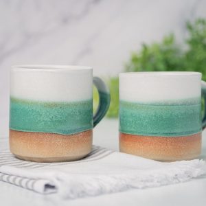 Artisan-Crafted Stoneware Mug An Enchanting Tapestry of White and Green