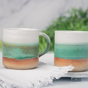 Artisan-Crafted Stoneware Mug An Enchanting Tapestry of White and Green