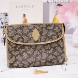 Authentic Yves Saint Laurent Clutch Timeless Elegance for the Modern Woman