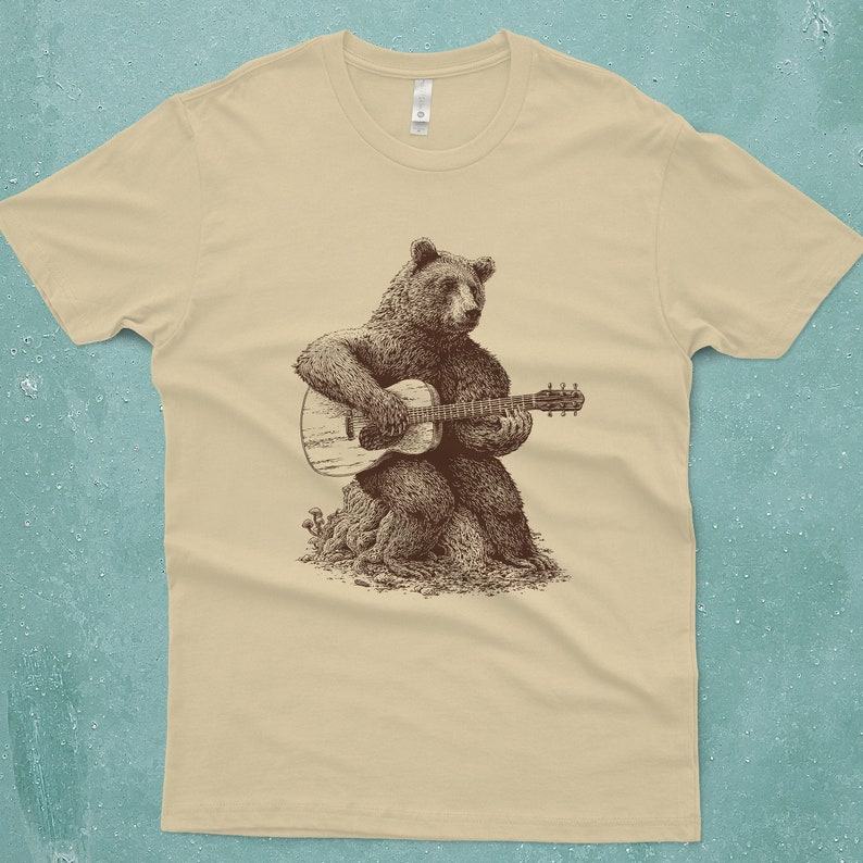Bear-tastic Guitar Grooves Unleash the Rhythm with Our Men’s Bear Guitar T-Shirt