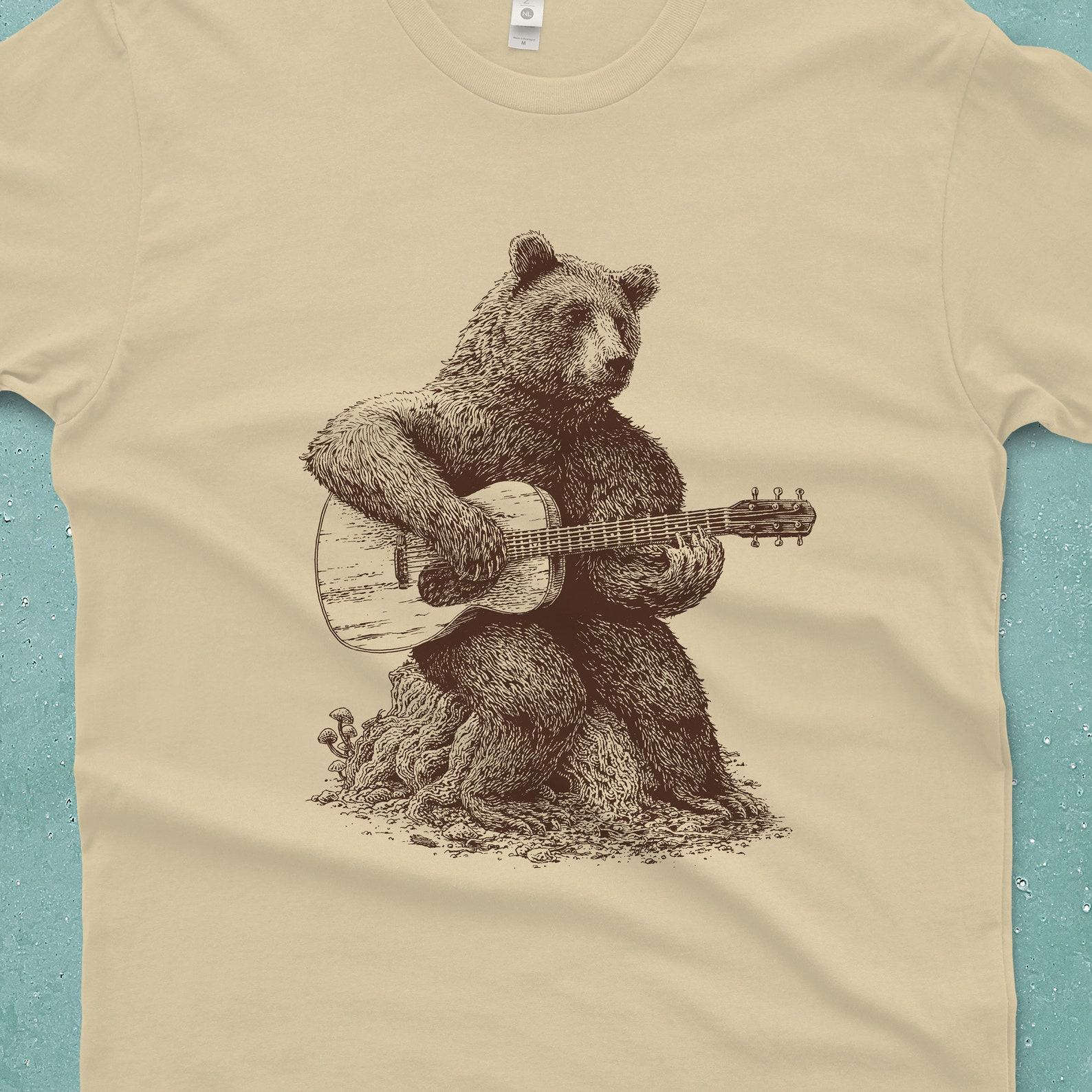 Bear-tastic Guitar Grooves Unleash the Rhythm with Our Men’s Bear Guitar T-Shirt