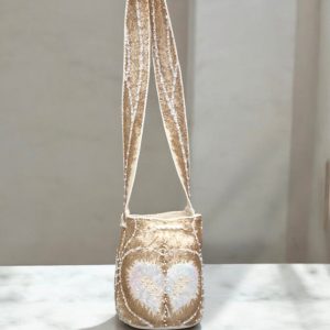 Best-Selling Wayuu Bucket Bag Handcrafted Colombian Crossbody Purse with Intricate White Cross Design