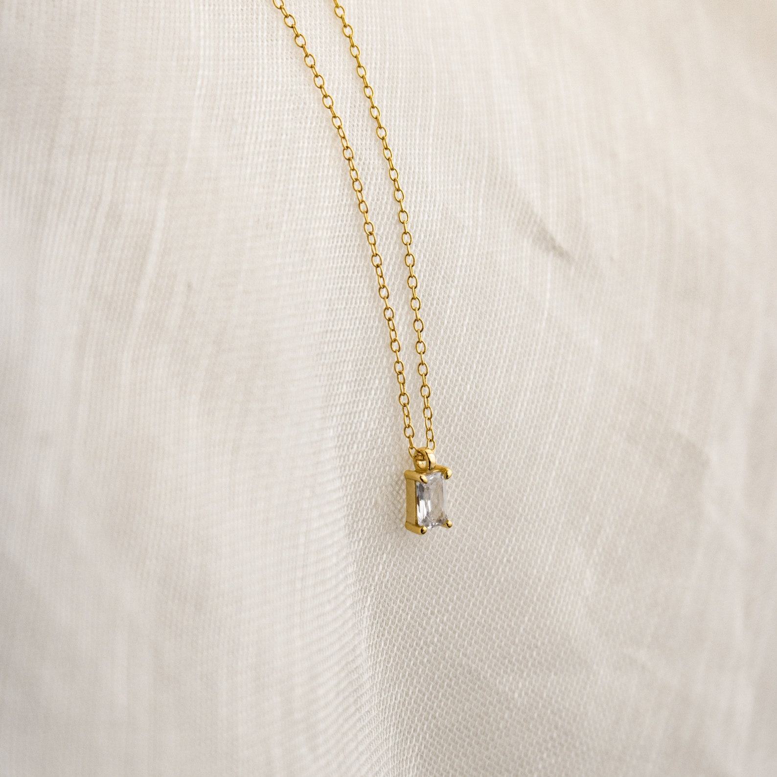 Caitlyn’s Minimalist Emerald Cut Diamond Necklace A Timeless Treasure for Bridesmaids and Beyond