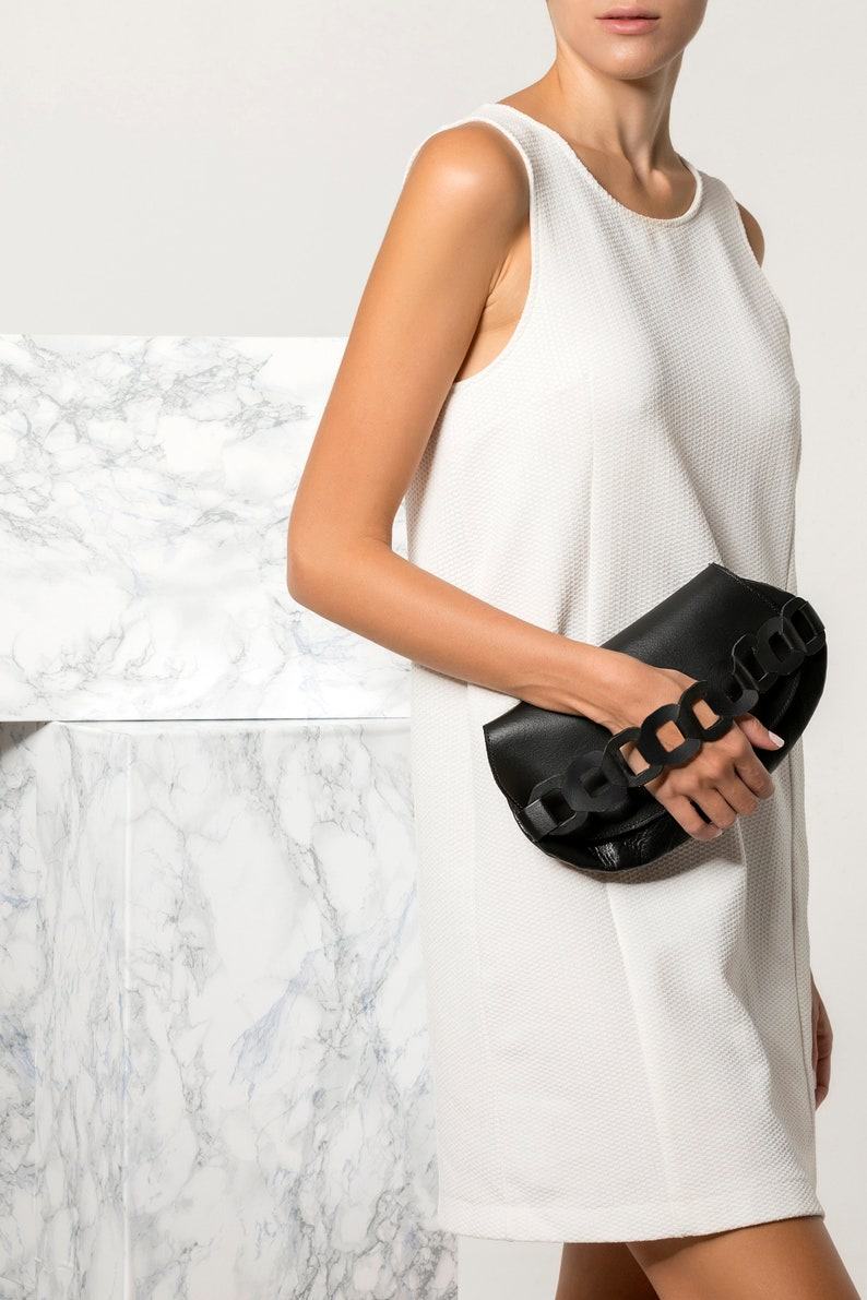 Captivating Black Leather Clutch A Timeless Accessory for Every Occasion