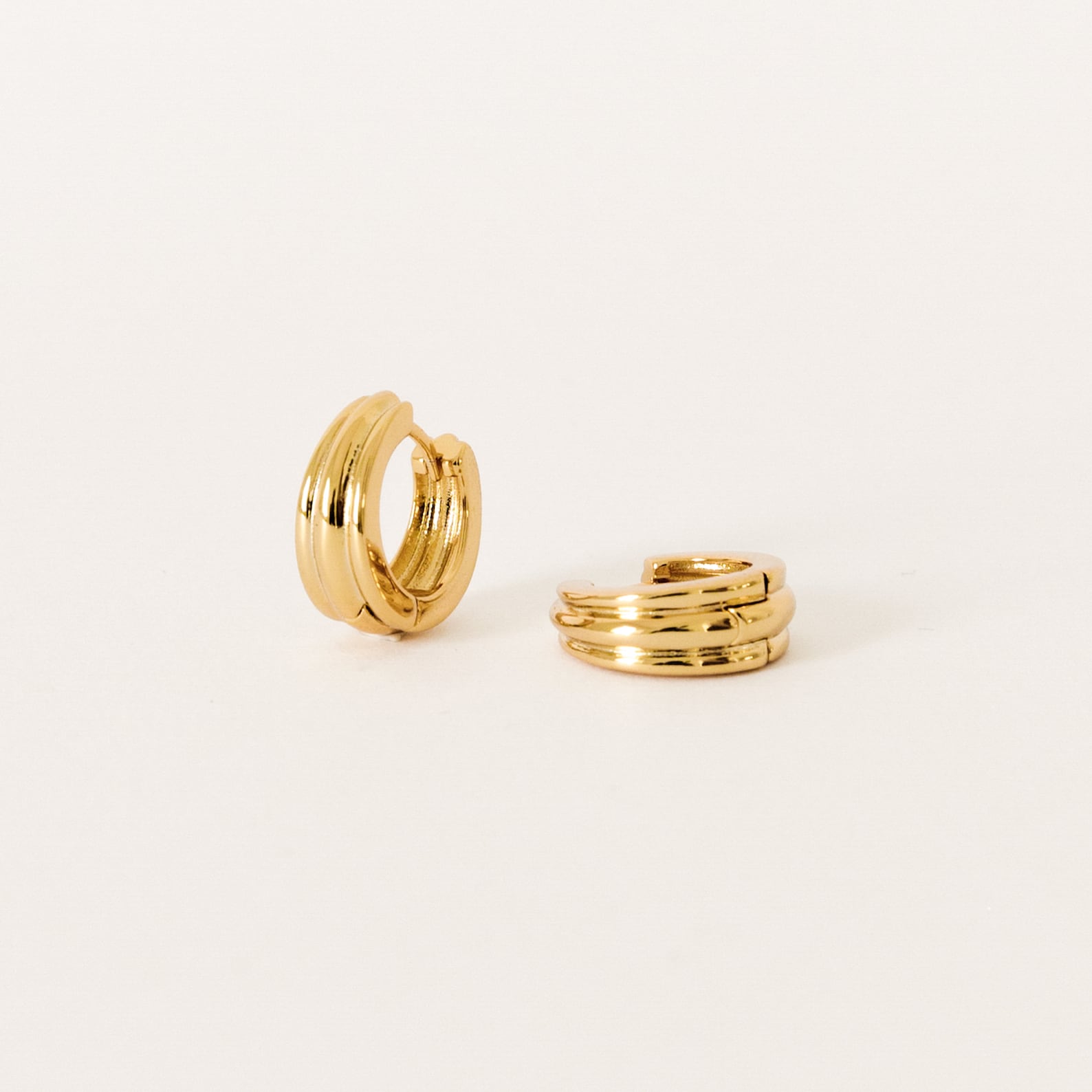 Captivating Canal Chunky Hoops Elevate Your Style with Minimalist Gold Jewelry
