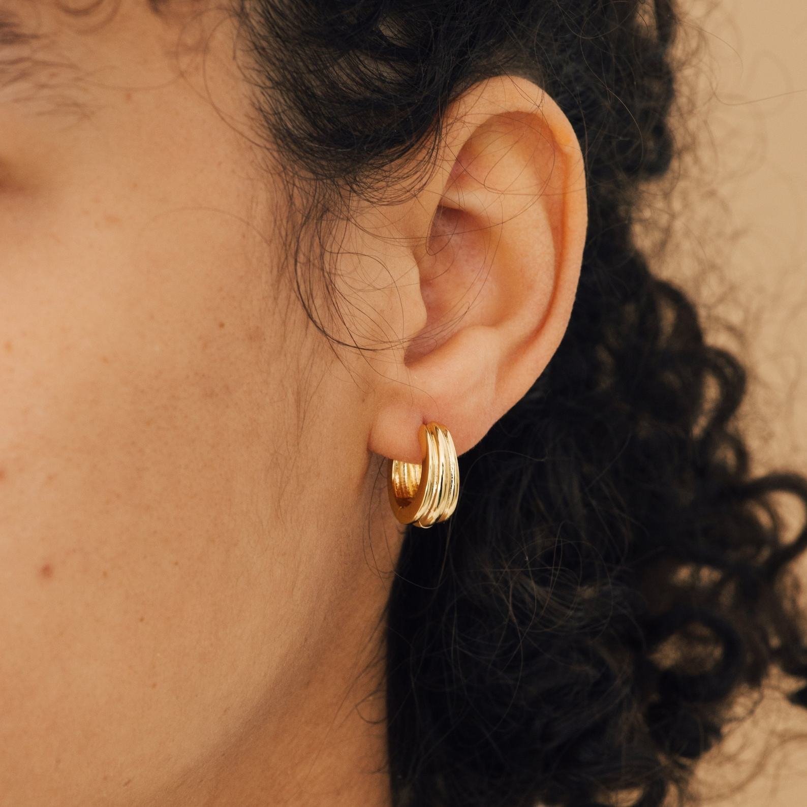 Captivating Canal Chunky Hoops Elevate Your Style with Minimalist Gold Jewelry