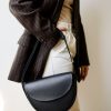 Captivating Half-Moon Leather Purse A Timeless Accessory for the Modern Woman