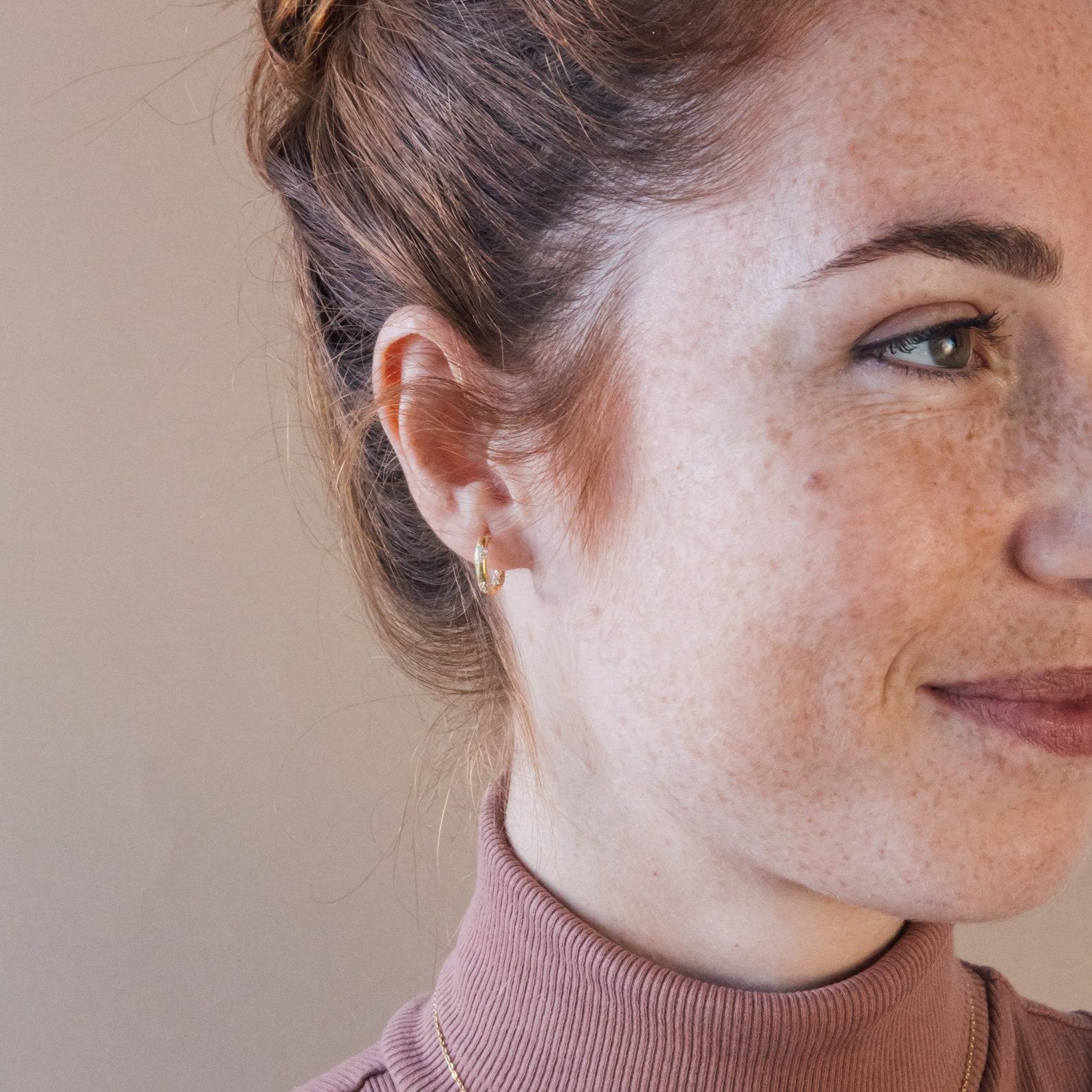 Celestial Embrace Caitlyn’s Eternity Pave Huggie Earrings, a Diamond-Studded Symphony