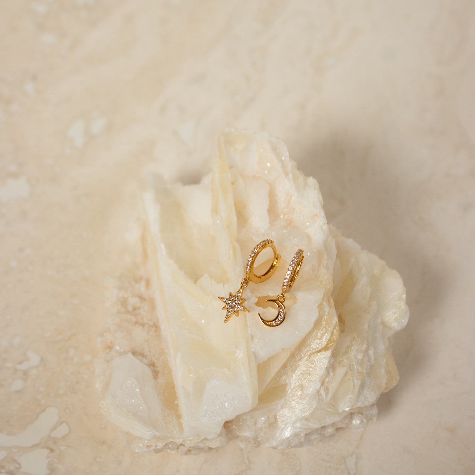 Celestial Embrace Moon and Star Pave Huggie Earrings – A Shimmering Item from the Heavens