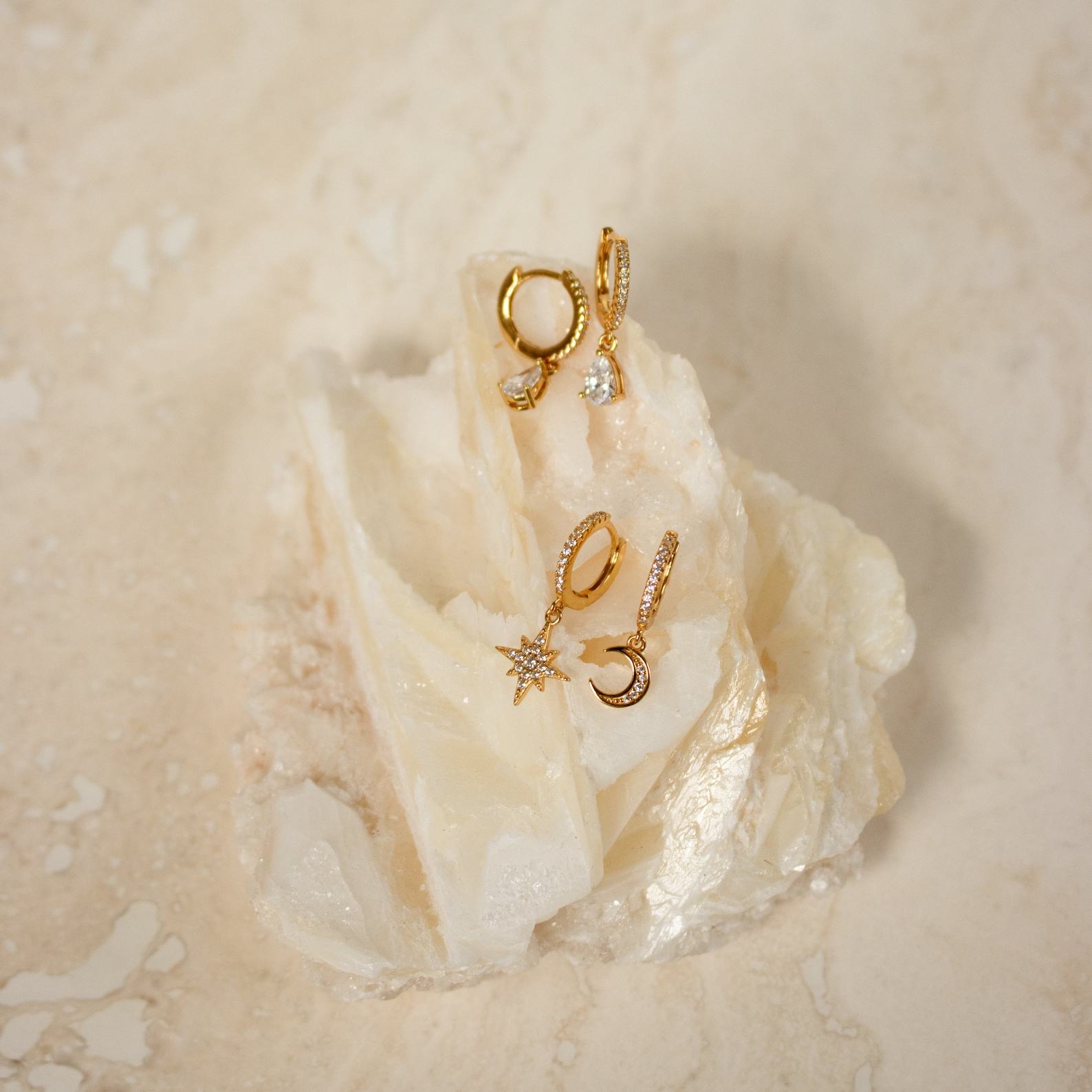 Celestial Embrace Moon and Star Pave Huggie Earrings – A Shimmering Item from the Heavens