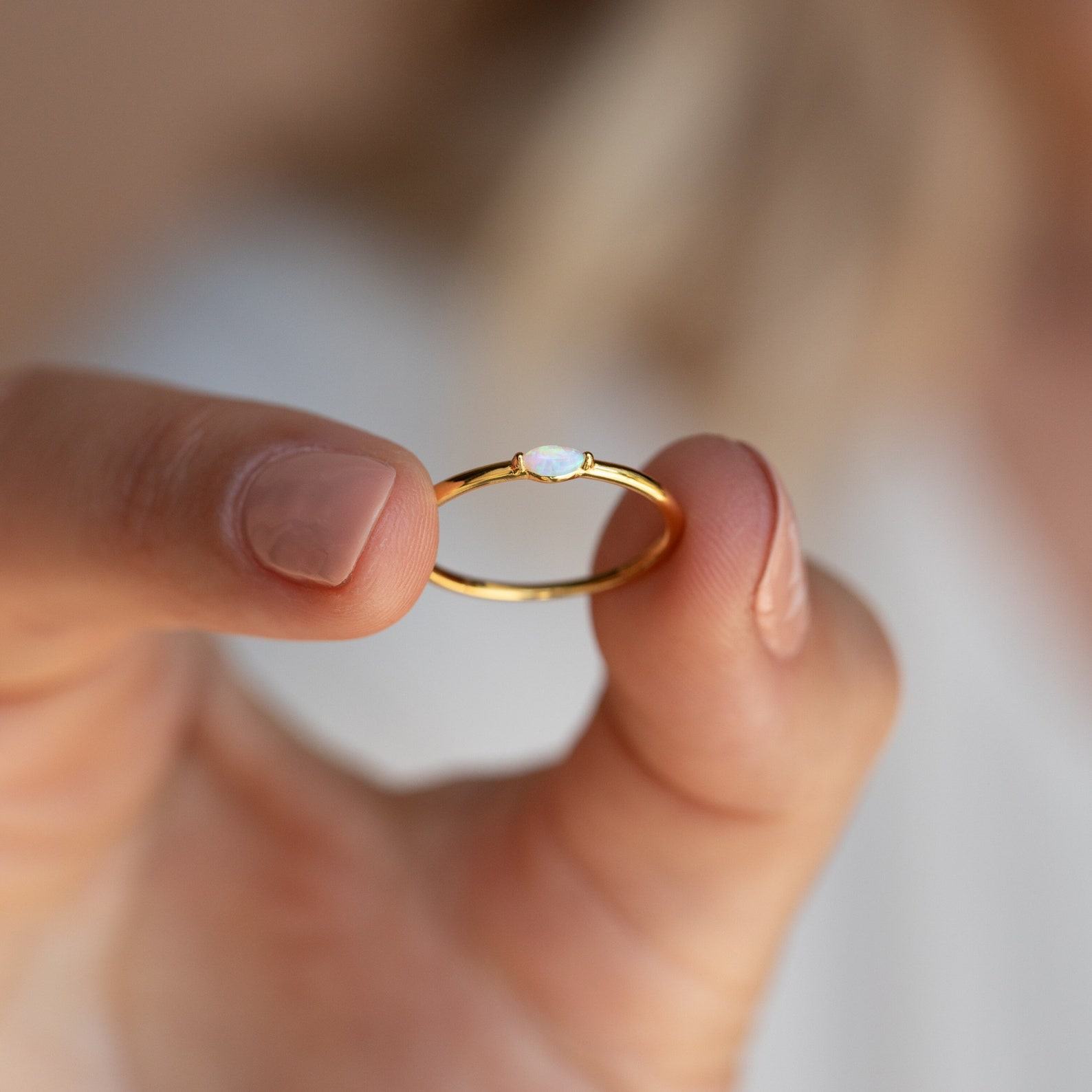 Celestial Radiance Caitlyn’s Delicate Opal Birthstone Ring for Timeless Elegance