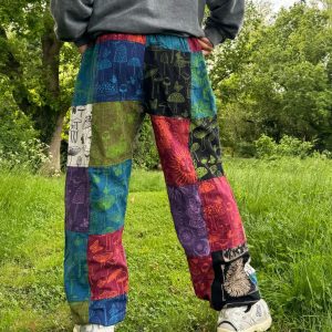 Celestial Tapestry Trousers Eco-Conscious Hippie Pants with Sun, Moon, and Mushroom Motifs