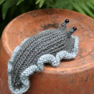 Charming Knitted Slug A Delightful Item for Garden Enthusiasts
