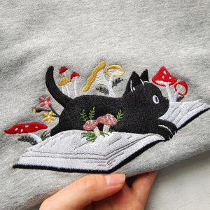 Cozy and Enchanting Embroidered Black Cat and Mushroom Sweatshirt for Cat Lovers