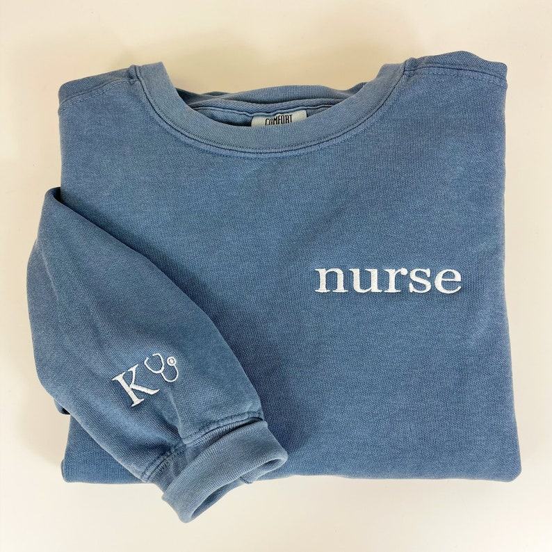 Cozy Comfort for Healthcare Heroes Embroidered Nurse Sweatshirt, Perfect for Graduation and Beyond