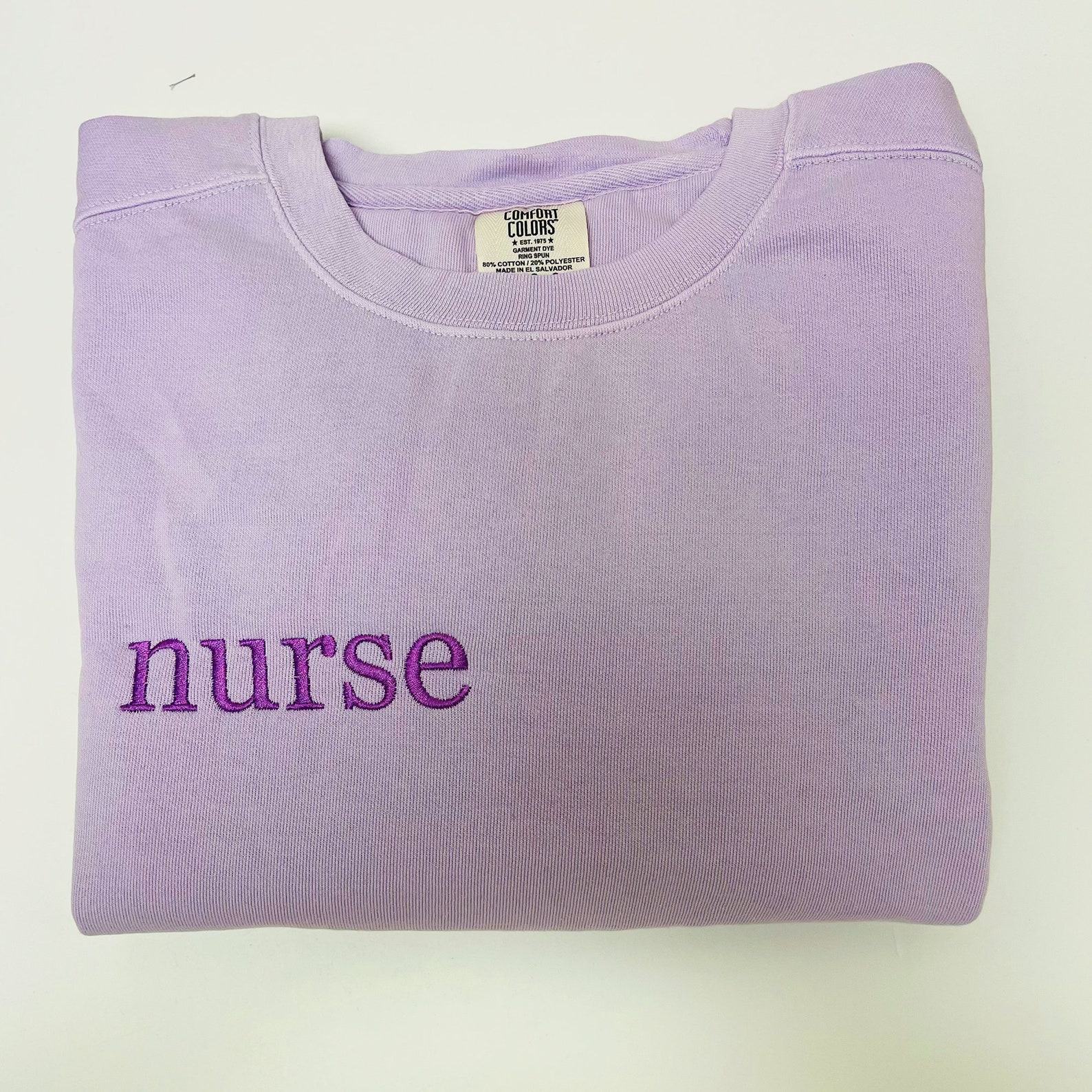 Cozy Comfort for Healthcare Heroes Embroidered Nurse Sweatshirt, Perfect for Graduation and Beyond