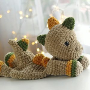 Cuddle Up with Prehistoric Charm Crochet Dinosaur Comforter and Lovey Pattern