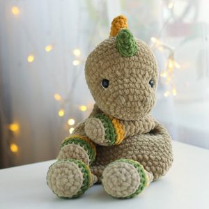 Cuddle Up with Prehistoric Charm Crochet Dinosaur Comforter and Lovey Pattern
