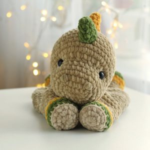 Cuddle Up with Prehistoric Charm Crochet Dinosaur Comforter and Lovey Pattern