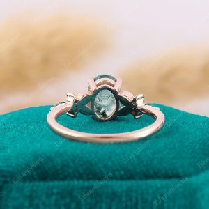 Enchanted Oval Moss Agate Engagement Ring A Nature-Inspired Symbol of Love