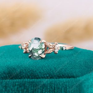 Enchanted Oval Moss Agate Engagement Ring A Nature-Inspired Symbol of Love