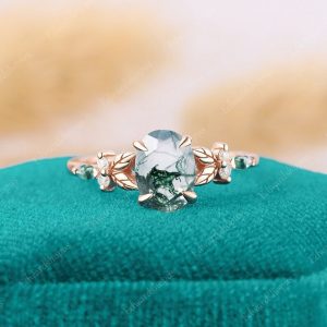 Enchanted Oval Moss Agate Engagement Ring A Nature-Inspired Symbol of Love