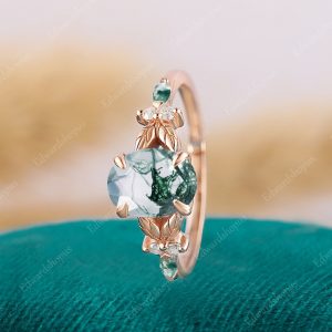 Enchanted Oval Moss Agate Engagement Ring A Nature-Inspired Symbol of Love
