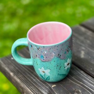 Enchanting Blue Guppy Daisies Pink Pixie Ceramic Mug A Delightful Item for Tea and Coffee Aficionados