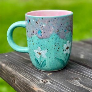 Enchanting Blue Guppy Daisies Pink Pixie Ceramic Mug A Delightful Item for Tea and Coffee Aficionados