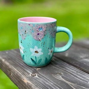 Enchanting Blue Guppy Daisies Pink Pixie Ceramic Mug A Delightful Item for Tea and Coffee Aficionados