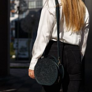 Exquisite Handmade Round Leather Bag with Intricate Flower Embossing