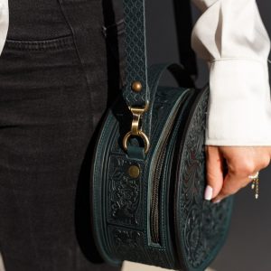 Exquisite Handmade Round Leather Bag with Intricate Flower Embossing