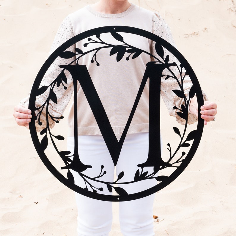 Exquisite Metal Circle Monogram with Vines A Timeless Symbol of Love and Unity
