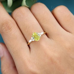 Exquisite Oval Cut Lab Yellow Diamond Engagement Ring A Unique Symbol of Love