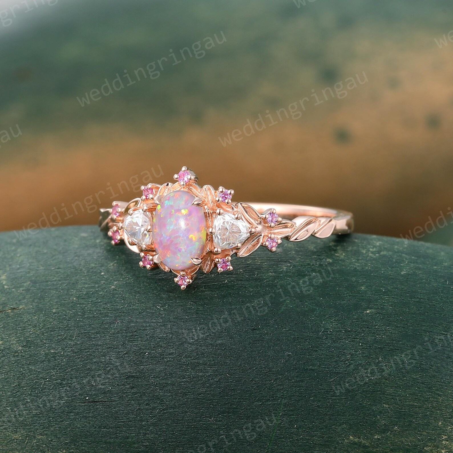 Exquisite Oval Pink Opal Engagement Ring A Symphony of Rose Gold, Moissanite, and Pink Sapphire