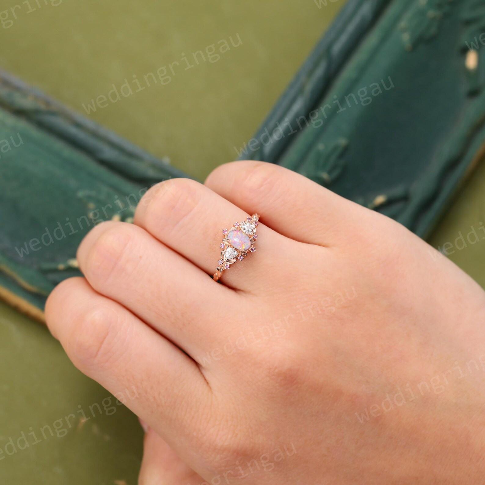 Exquisite Oval Pink Opal Engagement Ring A Symphony of Rose Gold, Moissanite, and Pink Sapphire