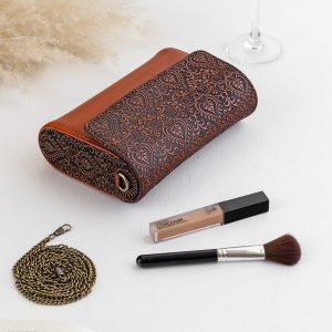 Exquisitely Crafted Orange Leather Sling Bag A Symphony of Teak Wood and Hand-Tooled Art