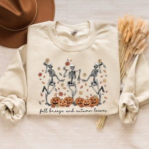 Fall into the Spooky Spirit with Our Dancing Skeletons Sweatshirt Embrace the Autumn Breeze and Autumn Leaves