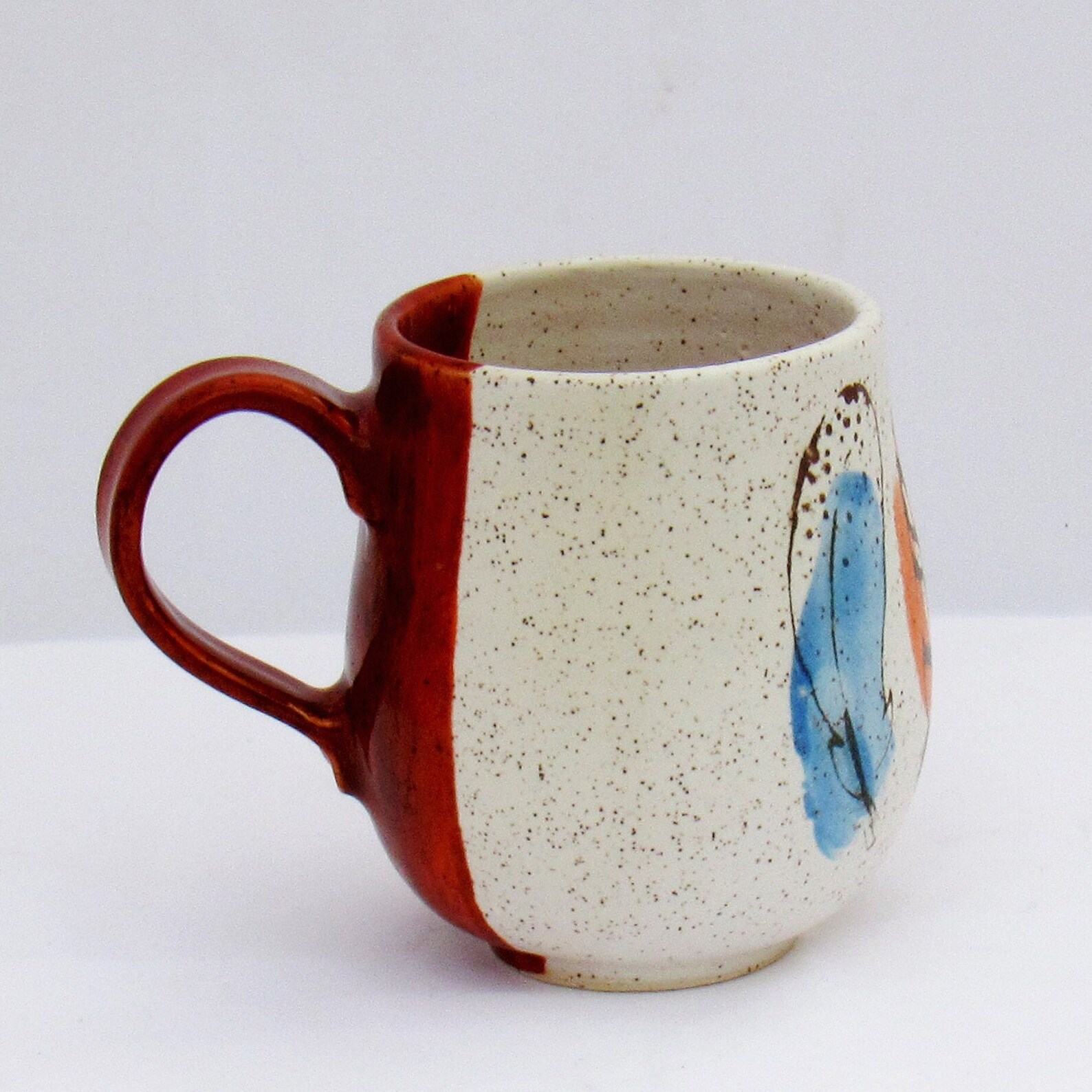 Feathers of Grace Handcrafted Ceramic Mug for an Elegant Touch