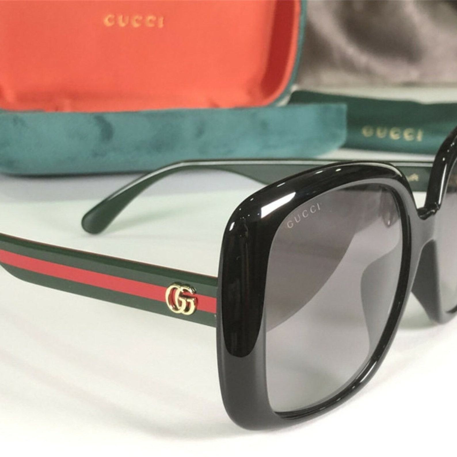 GG0713S Bold and Oversized Black Sunglasses for Women