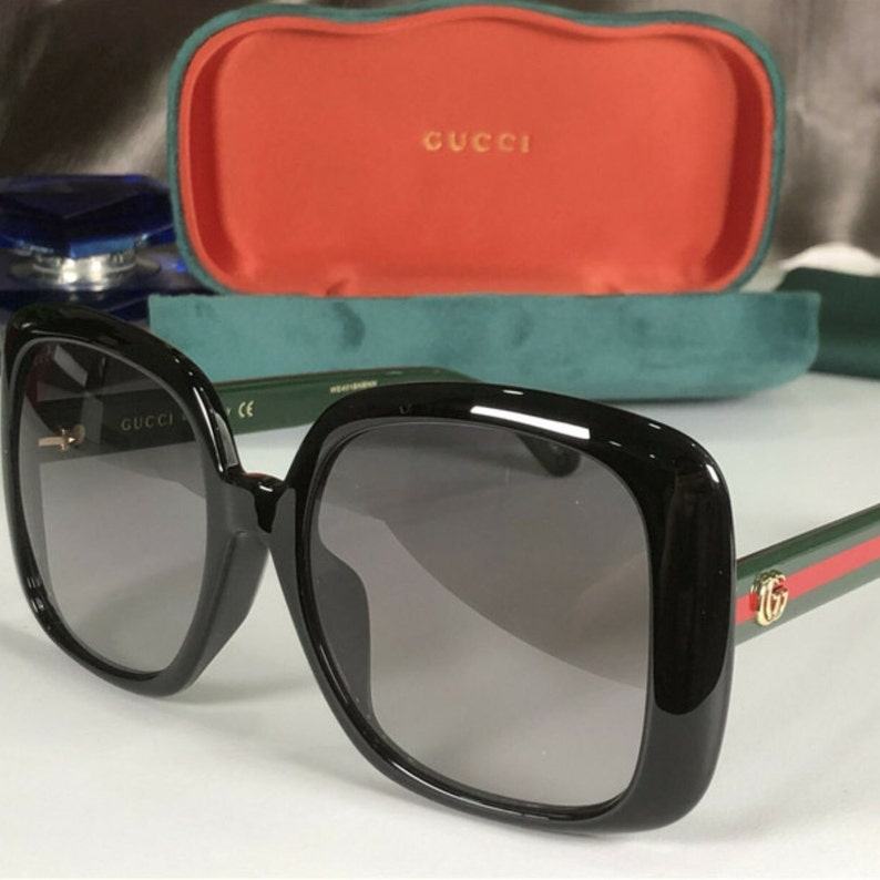 GG0713S Bold and Oversized Black Sunglasses for Women