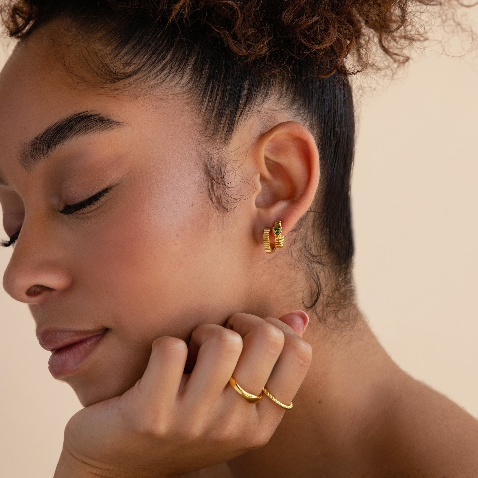 Golden Embrace Ribbed Huggie Hoops for a Timeless Allure
