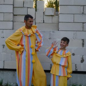Groovy Yellow Clown Costume Vintage Stripes Circus Jumpsuit for Halloween, Cosplay, and Parties