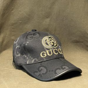 Gucci Vintage Black Cap A Timeless Monogrammed Masterpiece