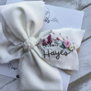 Hand Embroidered Name Bow A Personalized Touch for Special Occasions