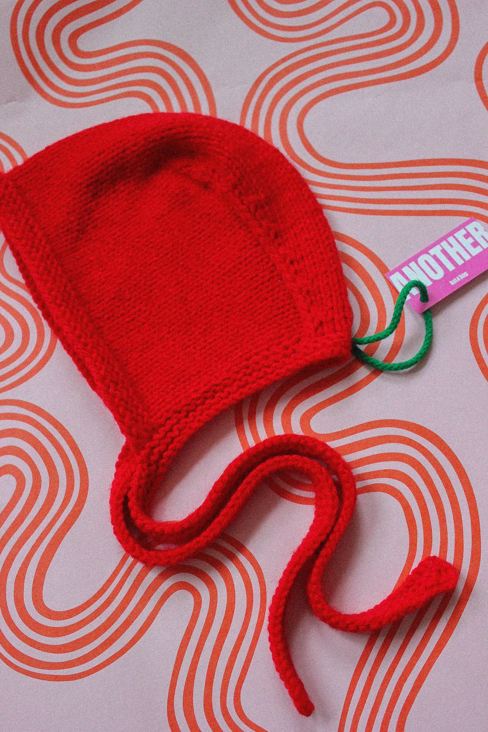 Hand-Knitted Crimson Bow Tie Bonnet A Timeless Accessory for the Discerning Gentleman - Image 6