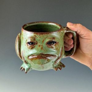 Handmade Masterpiece Elevate Your Daily Brew with Our Unique Pottery Mug